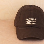 Alphabet Bags Caffeine Reliance Alliance embroidered cotton baseball cap.