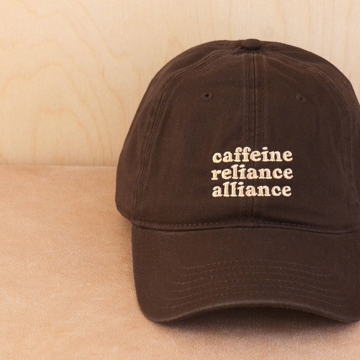 Alphabet Bags Caffeine Reliance Alliance embroidered cotton baseball cap.