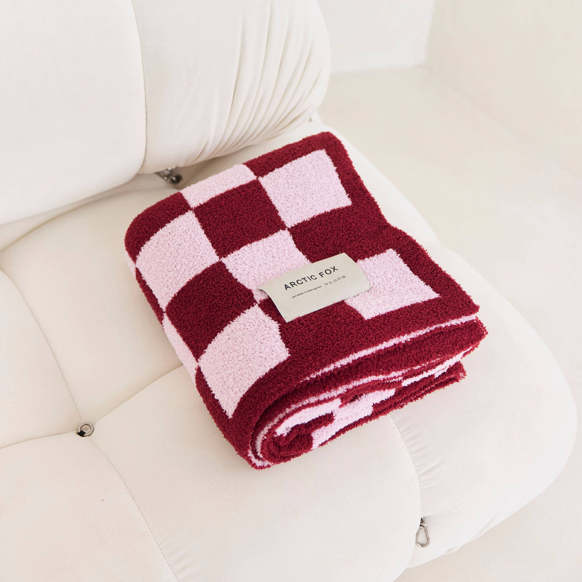 Arctic Fox & Co. super-soft Teddy Throw Blanket in Pink Check.