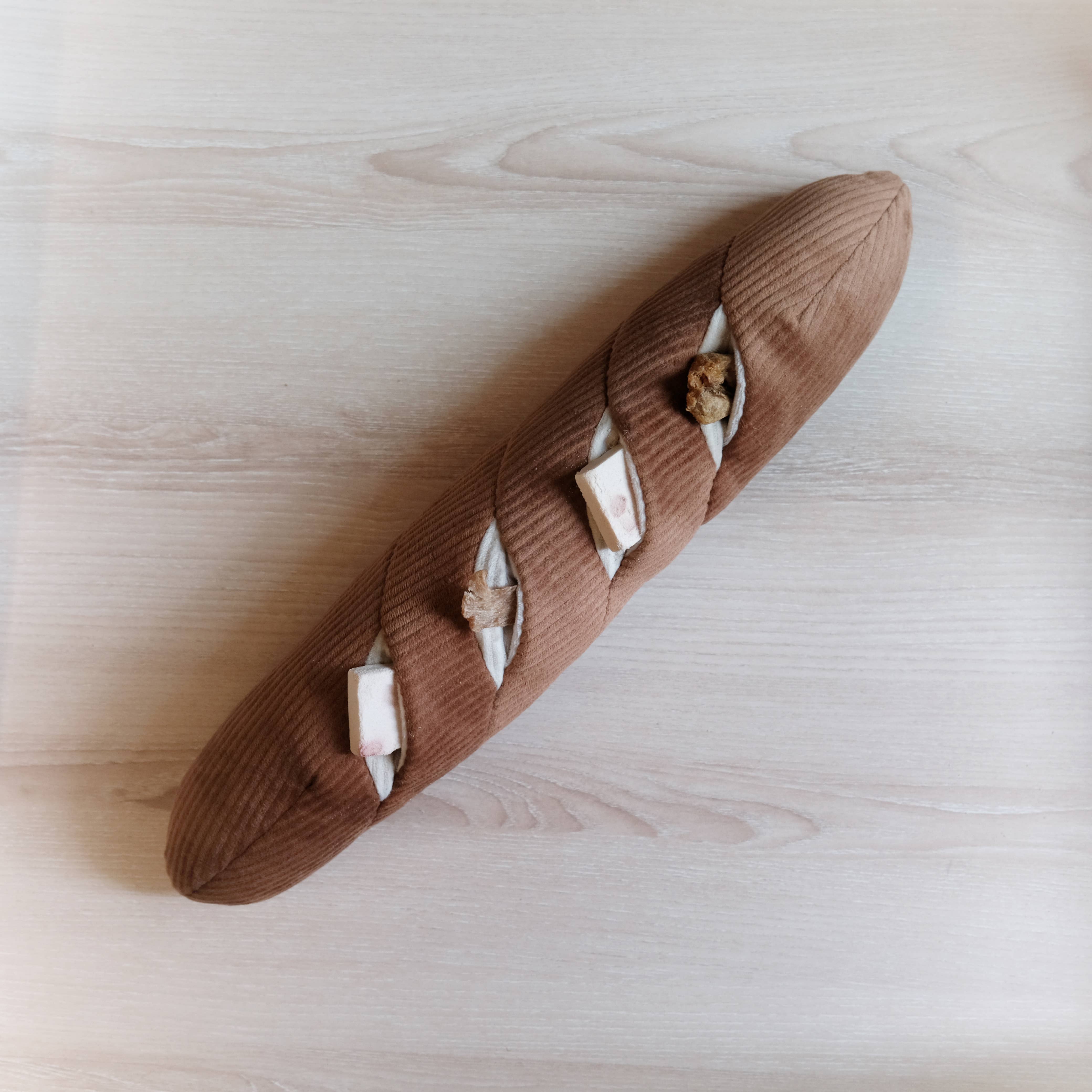 Lambwolf BAGUETTE enrichment toy with four hidden treat pockets