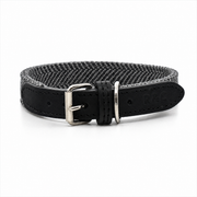 Close-up of Balmoral dog collar featuring grey herringbone fabric and black Italian leather