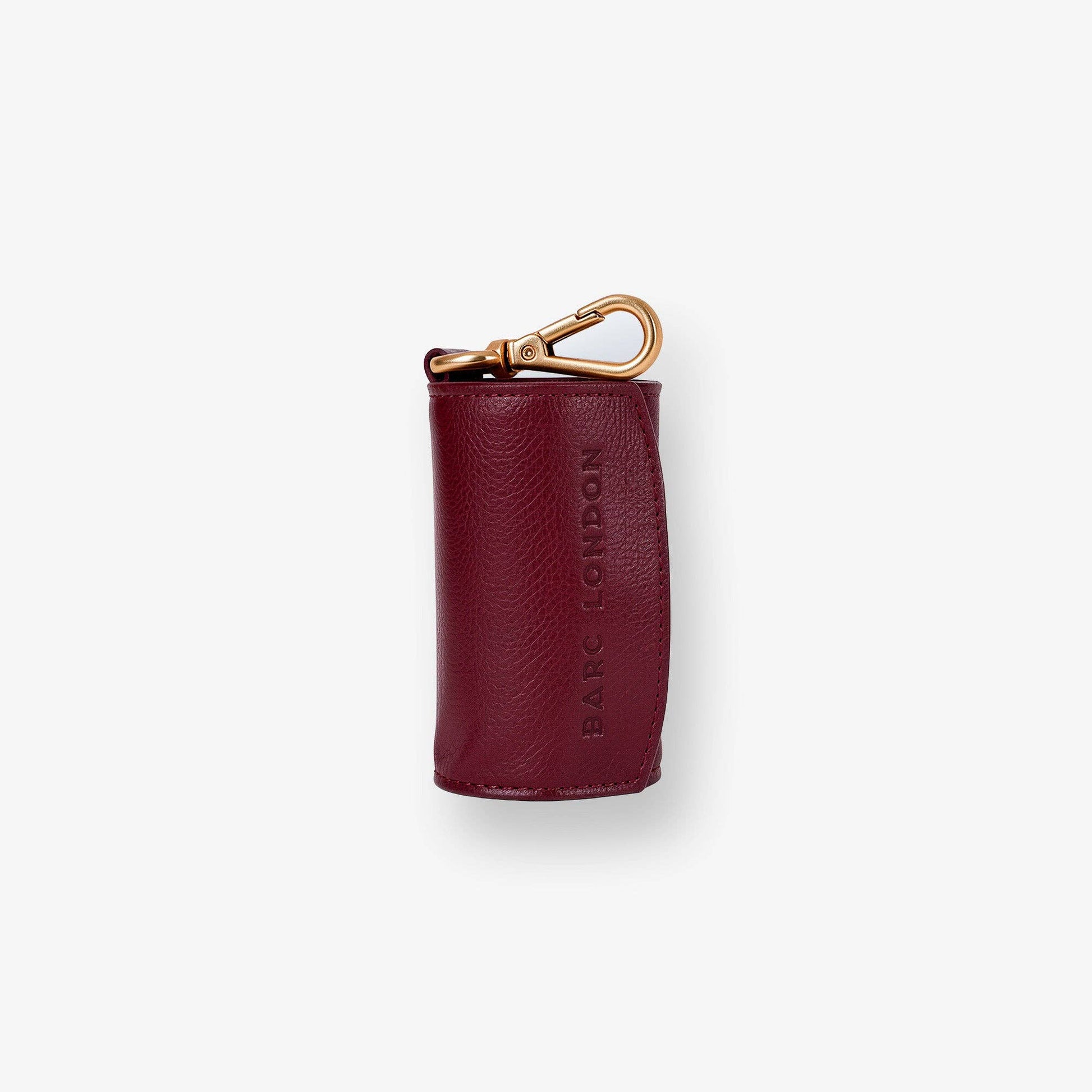 Barc London Merlot Red dog waste bag holder with gold-tone hardware.