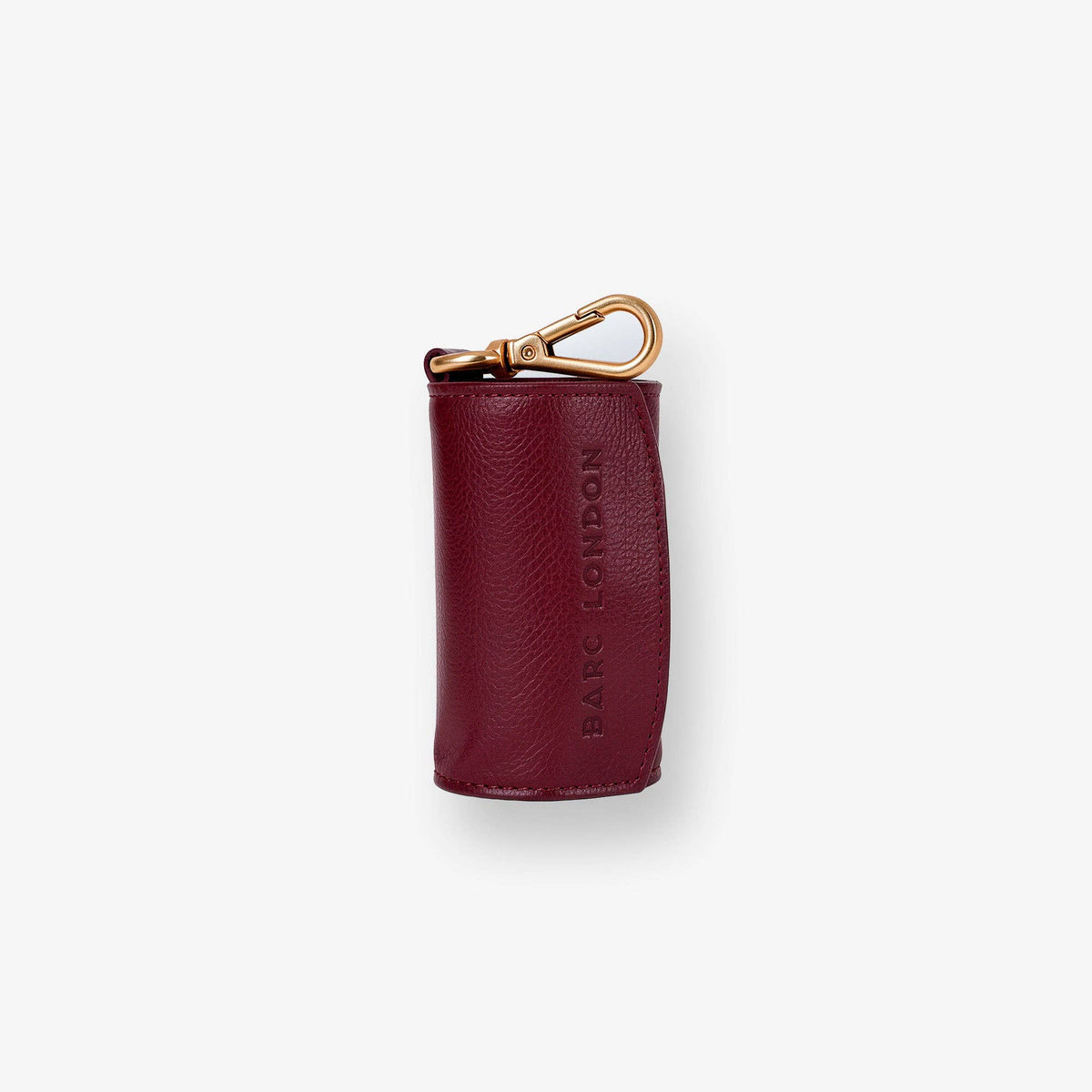 Barc London Merlot Red dog waste bag holder with gold-tone hardware.