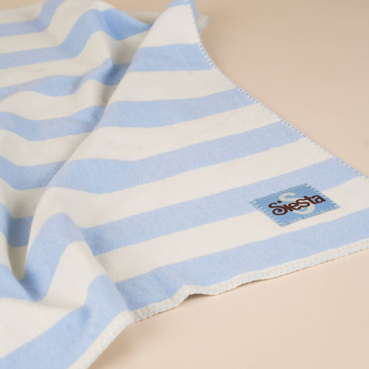 Luxury blue and cream striped dog blanket by Siesta.