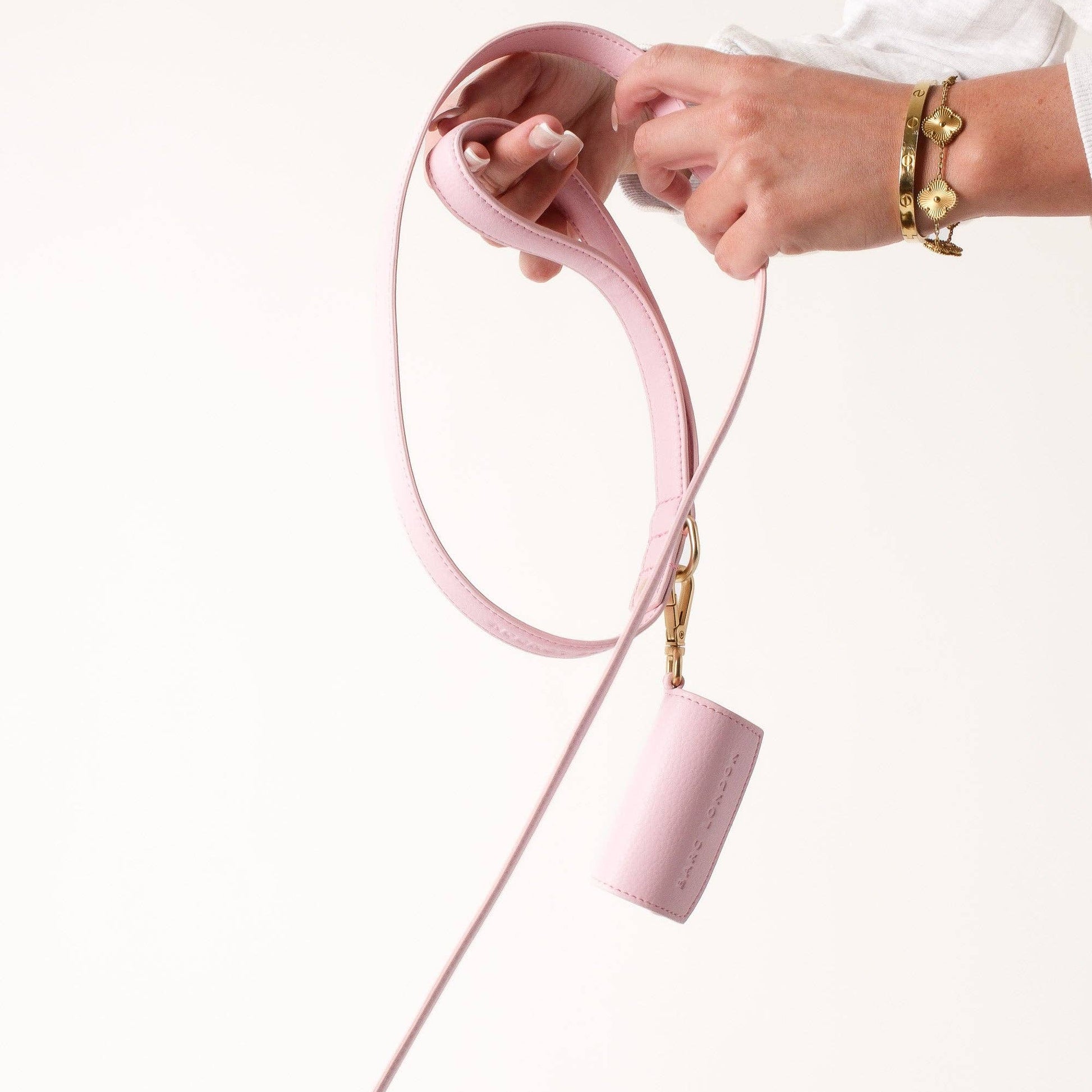 Soft blush pink dog lead with rose-gold clasp by Barc London.