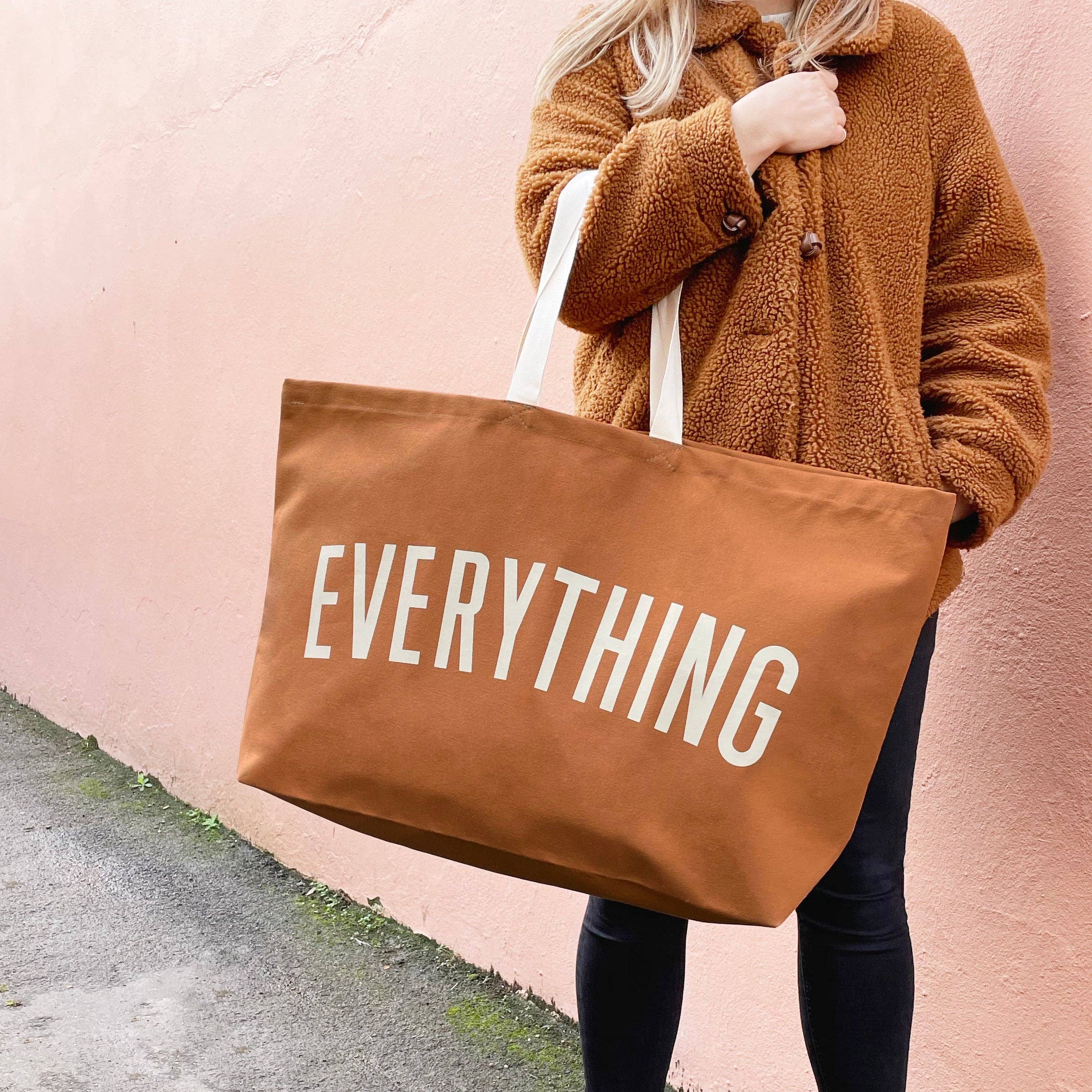 Handmade oversized cotton canvas bag with deep flat base and shoulder handles.