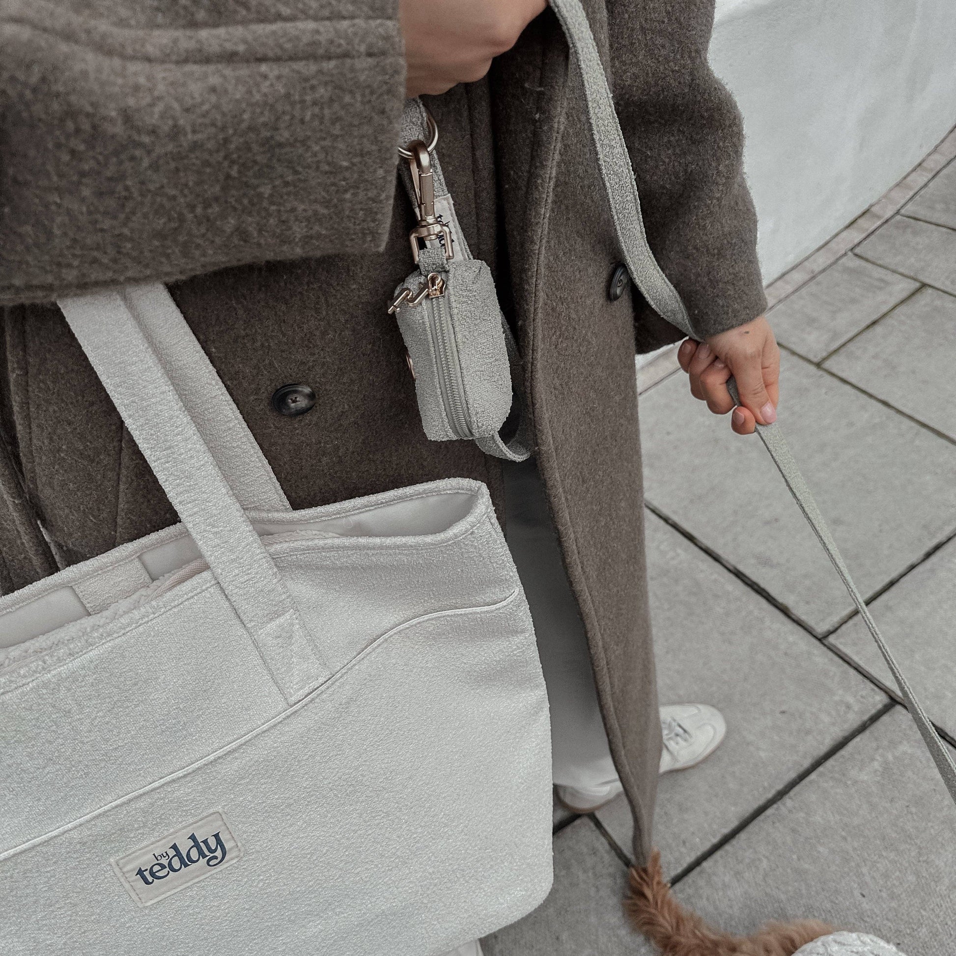 Close up of the premium matte gold hardware on the By Teddy Matcha Bouclé Dog Lead