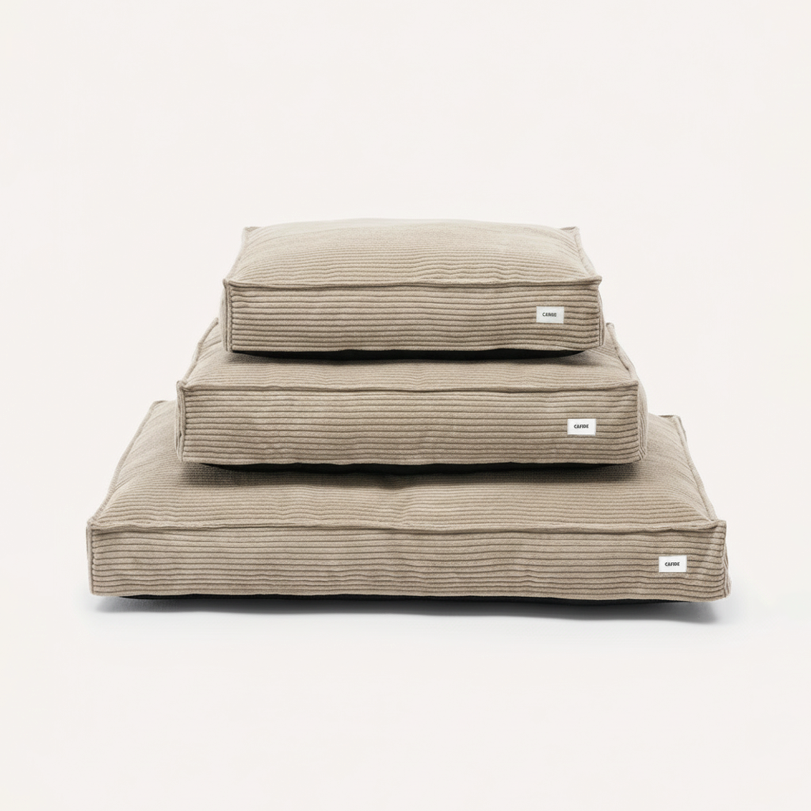 CAFIDE Cuadra beige corduroy dog bed with supportive recycled foam filling and removable washable cover.