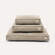 CAFIDE Cuadra beige corduroy dog bed with supportive recycled foam filling and removable washable cover.