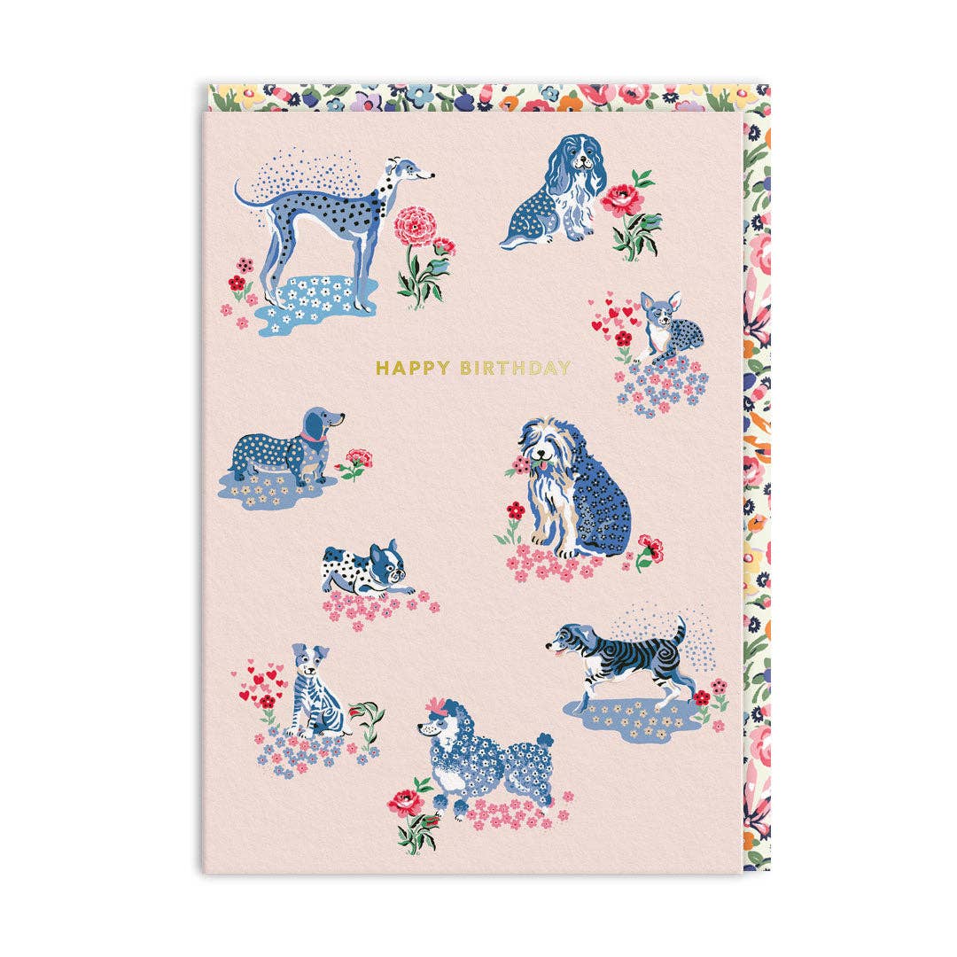 Cath Kidston Happy Birthday Puppy Fields card featuring playful illustrated dogs.