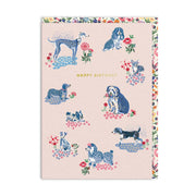 Cath Kidston Happy Birthday Puppy Fields card featuring playful illustrated dogs.