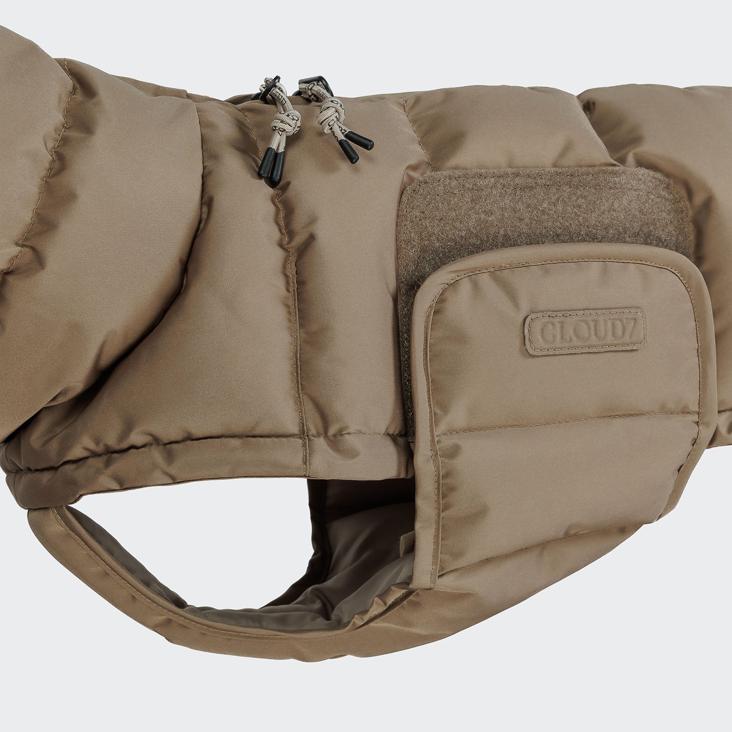 Premium Dachshund coat with waterproof harness zip and sustainable recycled materials.