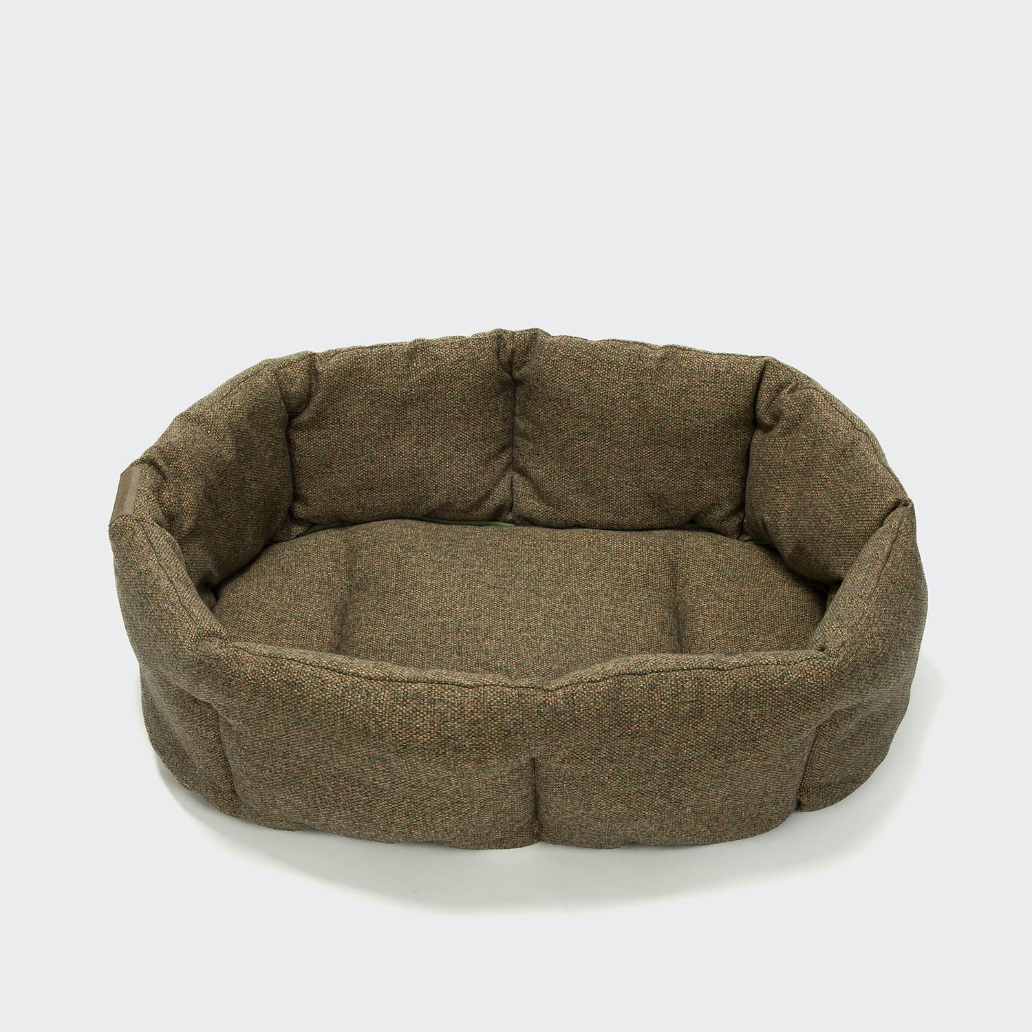 Brown pet bed on a white background