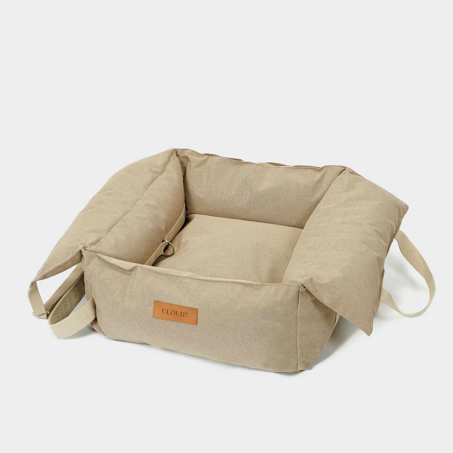 Cloud7 Portable Dog Car Seat Getaway Sand with padded interior and integrated safety attachment from Bell & Beau.