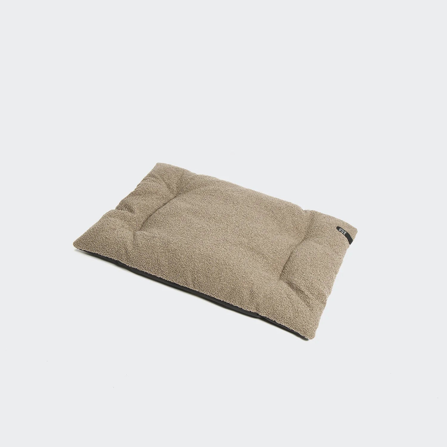 Premium dog cushion with removable washable cover and recycled filling.