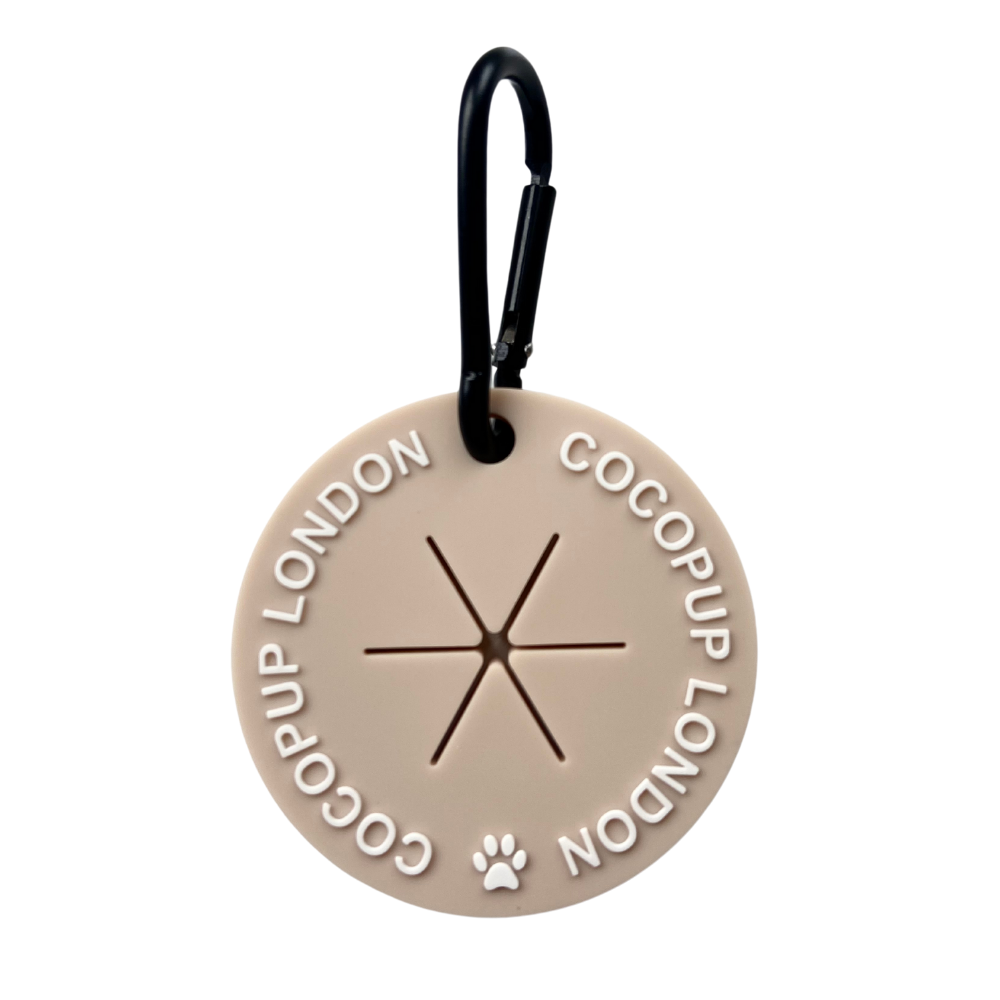 Cocopup London CocoPOOP Pocket Nude hands-free used dog poo bag carrier.