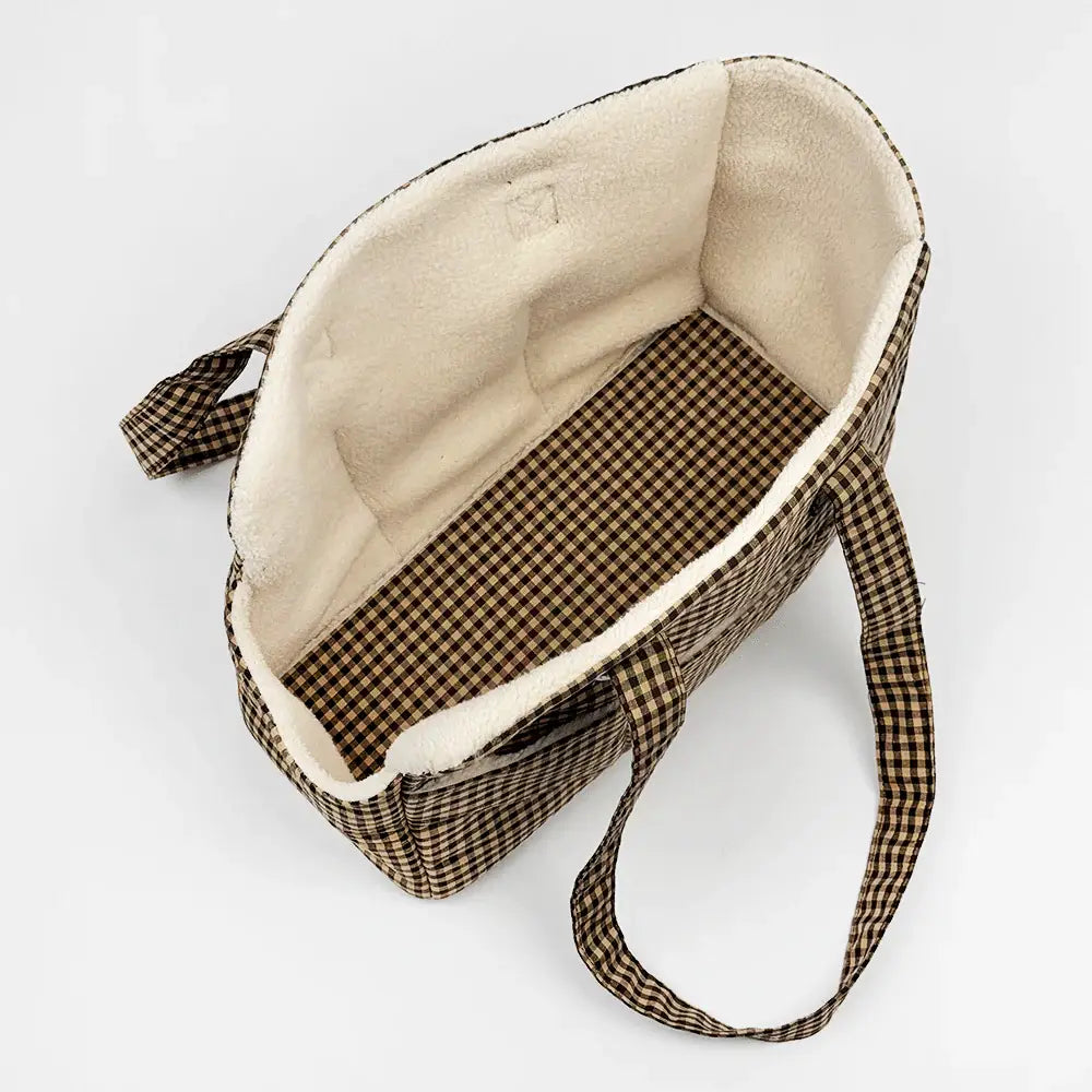Stylish checked tote-style dog carrier with reversible cosy Borg insert.