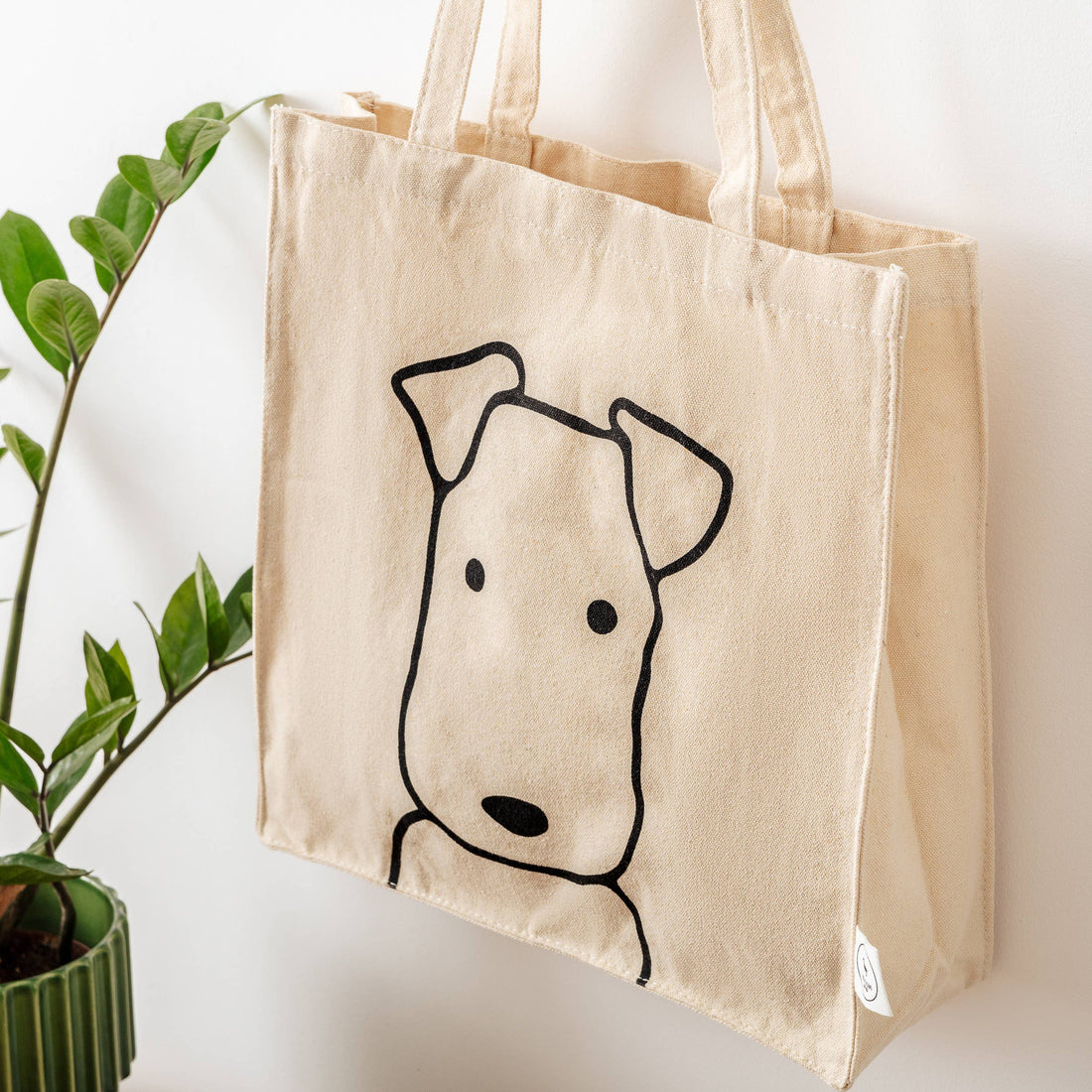 Reusable cream canvas dog tote bag by Park Life Designs.