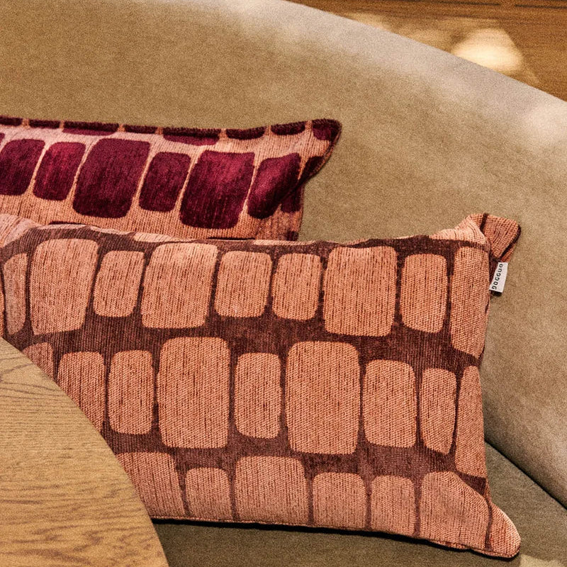 Brown and peach DOGGUO Staple Stones cushion in woven jacquard fabric