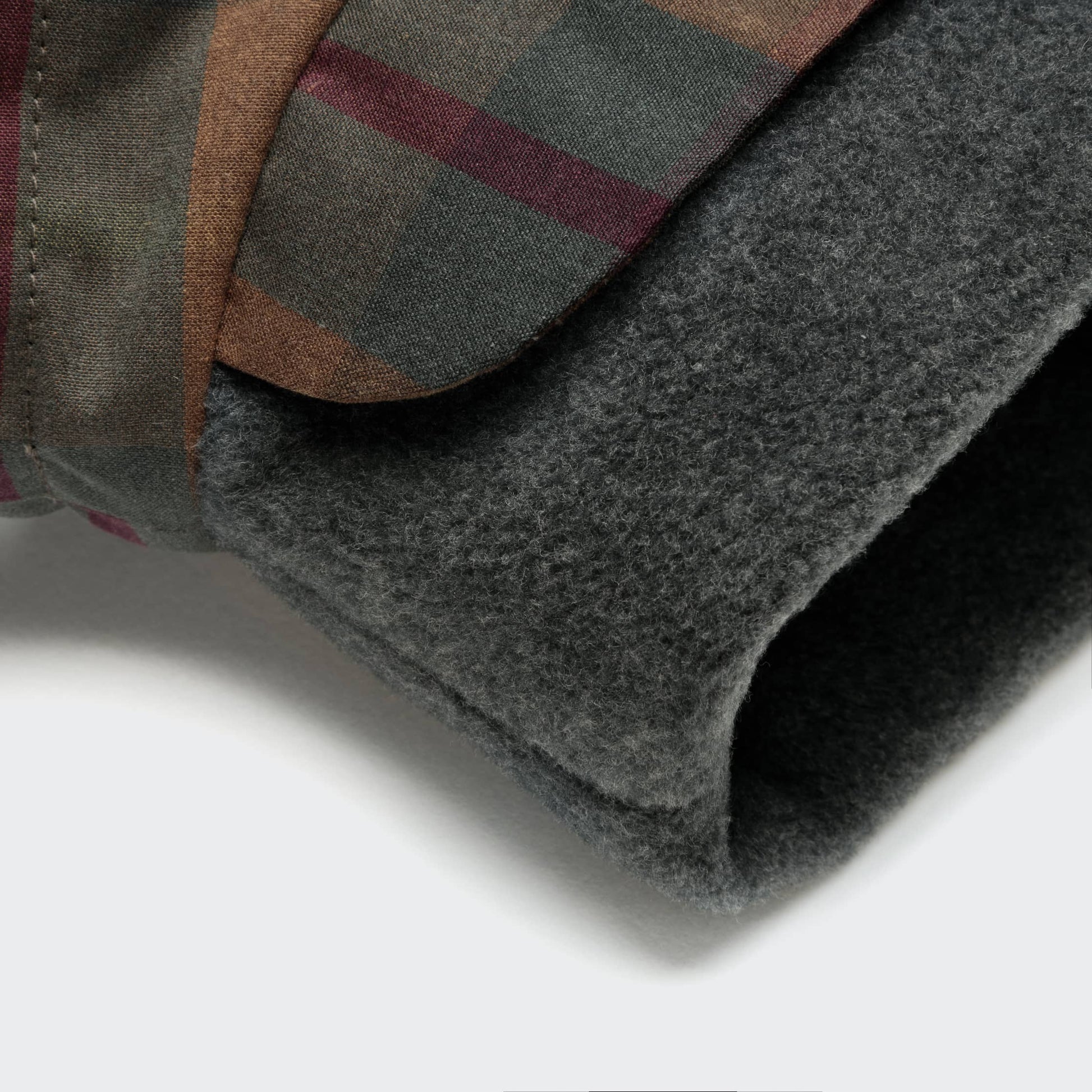 Cloud7 Brooklyn Waxed Tartan coat providing warmth and weather protection for Dachshunds.