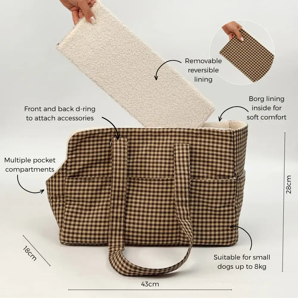 Cocopup designer dog carrier with storage pockets for small dogs and puppies.