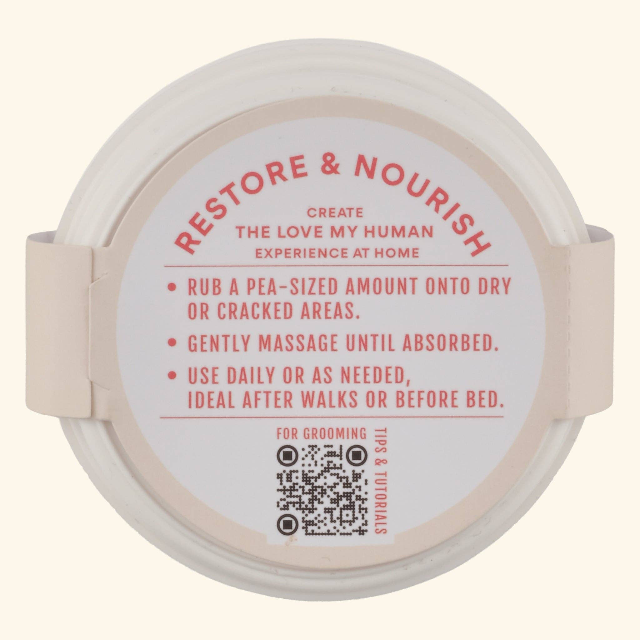Nourishing dog paw balm for dry and rough paw pads.