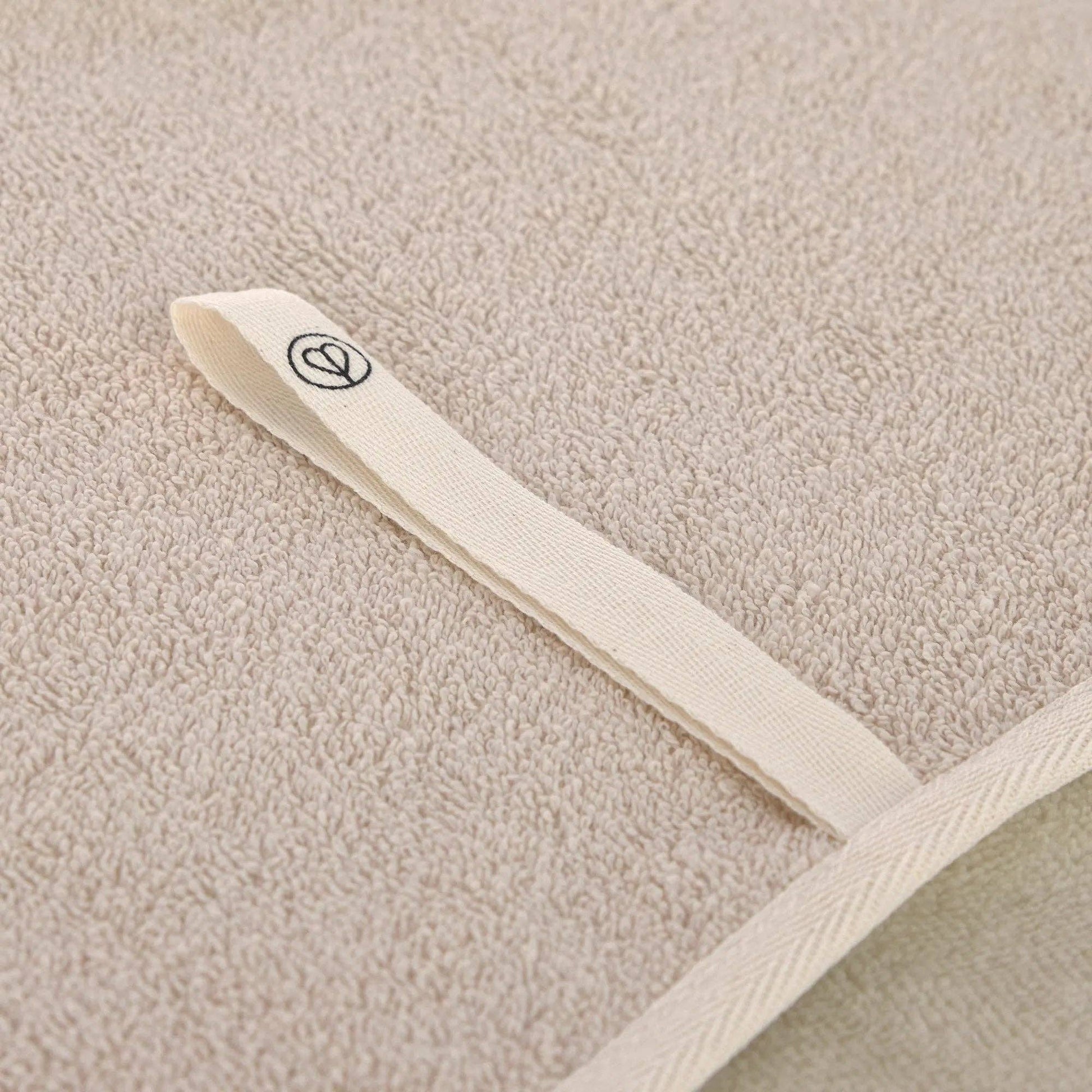 PALOPA Kosy beige dog towel designed for drying dogs after swimming, beach visits and water activities.