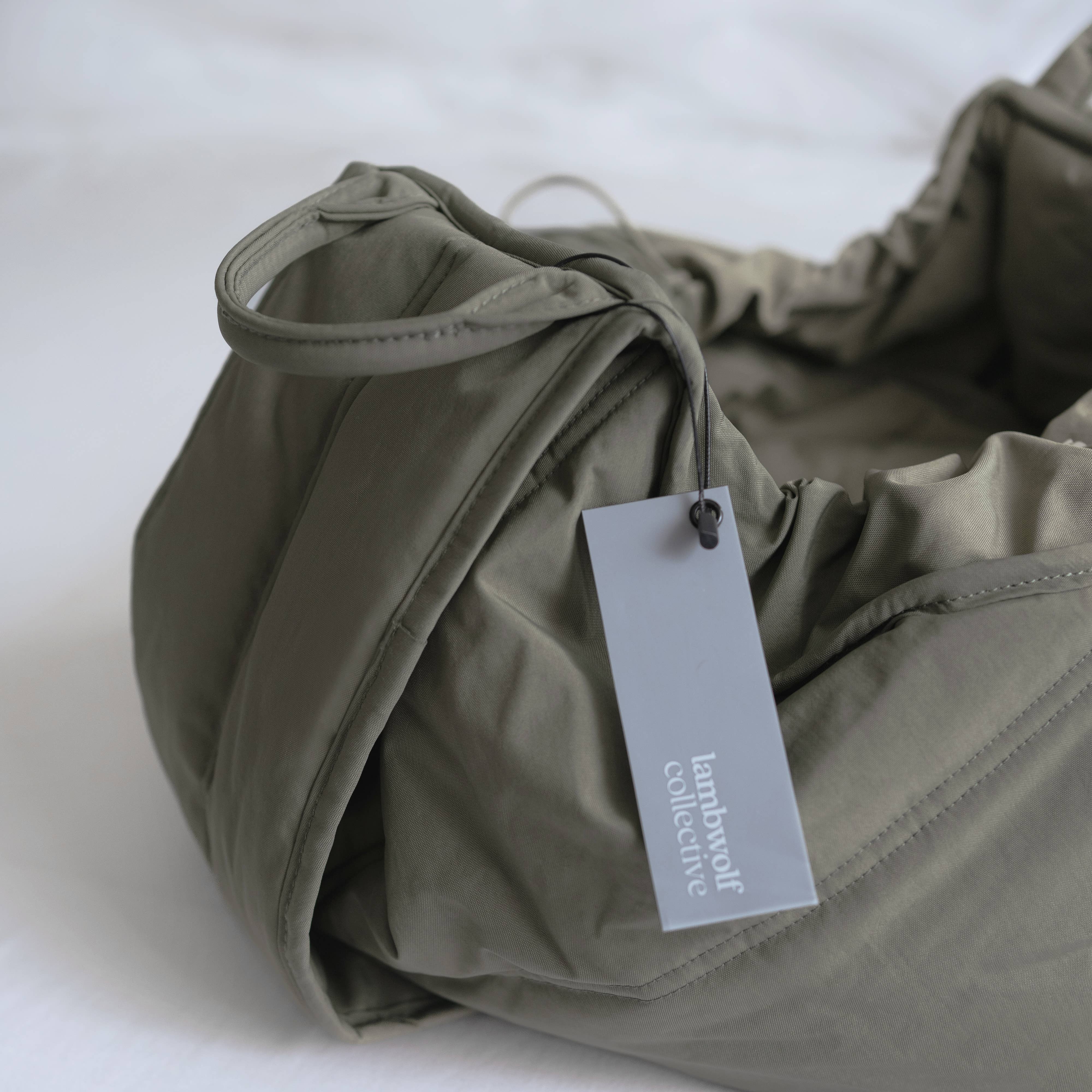 Portable dog carrycot designed for puppies and small breeds