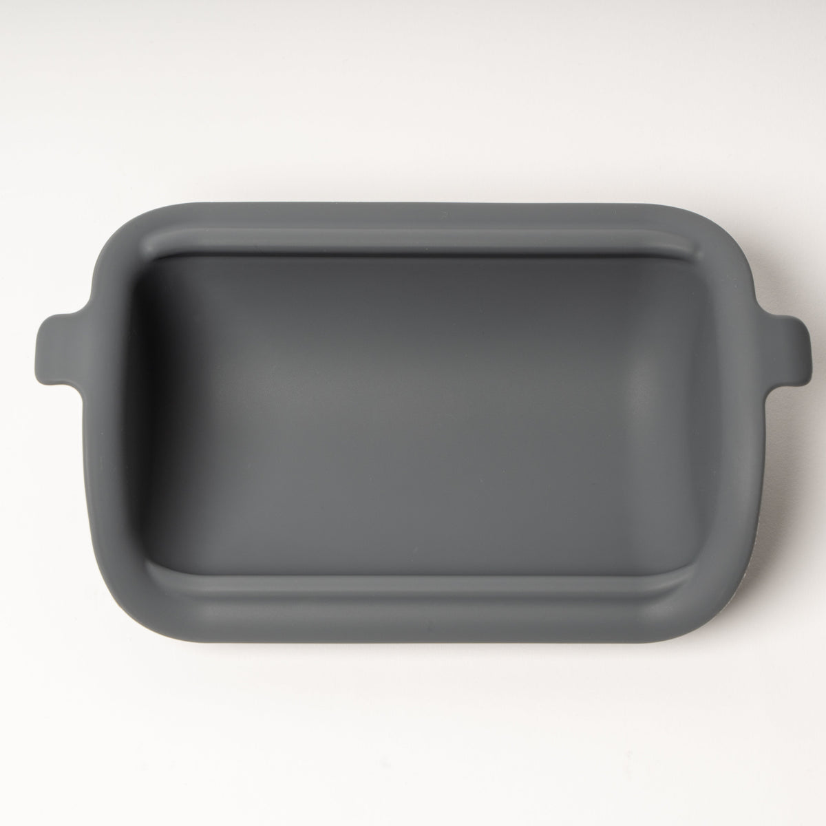 Gray rectangular baking dish on a white background