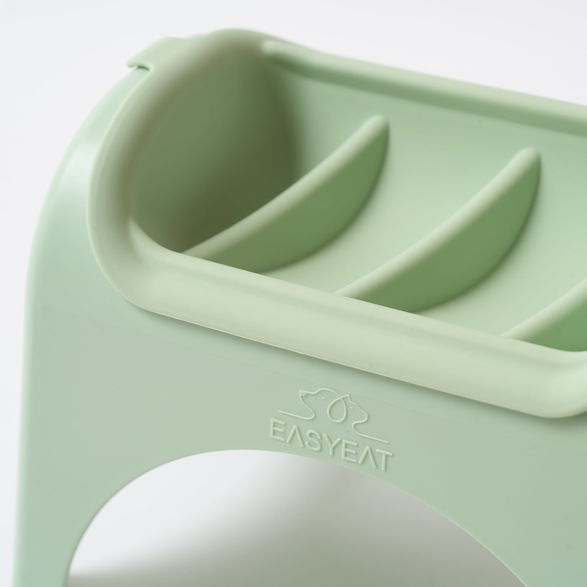 Green silicone product with 'EASYEAT' branding on a white background