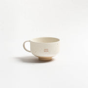 Egg Back Home Caelum Dog Mom handcrafted stoneware mug in speckled white.
