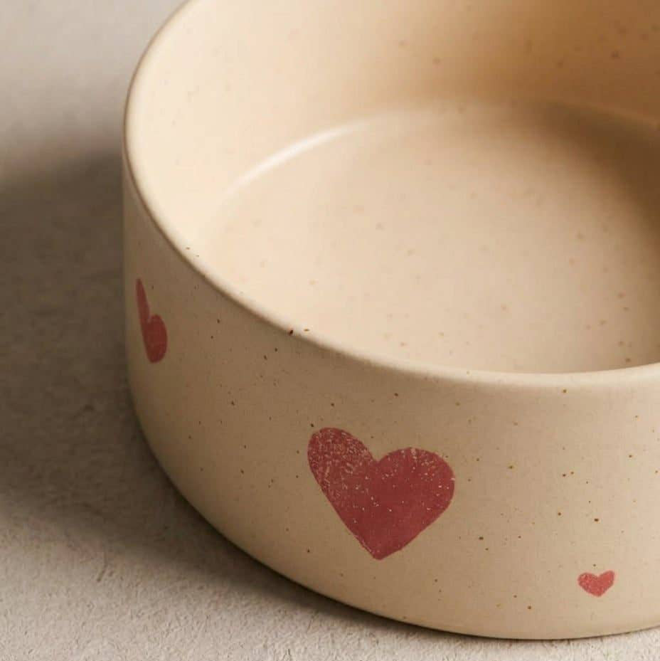 Handcrafted stoneware detail on the Egg Back Home Cozy Hearts large pet bowl set