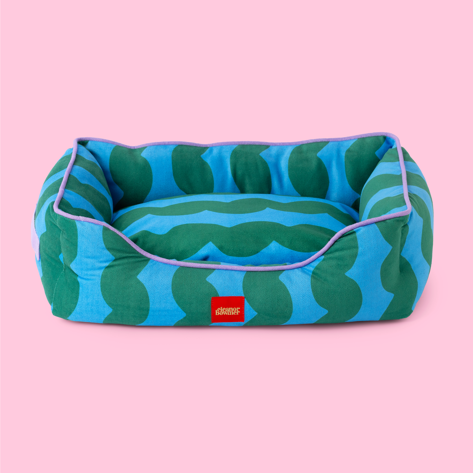 Eleanor Bowmer Wavy Stripe Basket Pet Bed with colourful striped design and raised padded sides.
