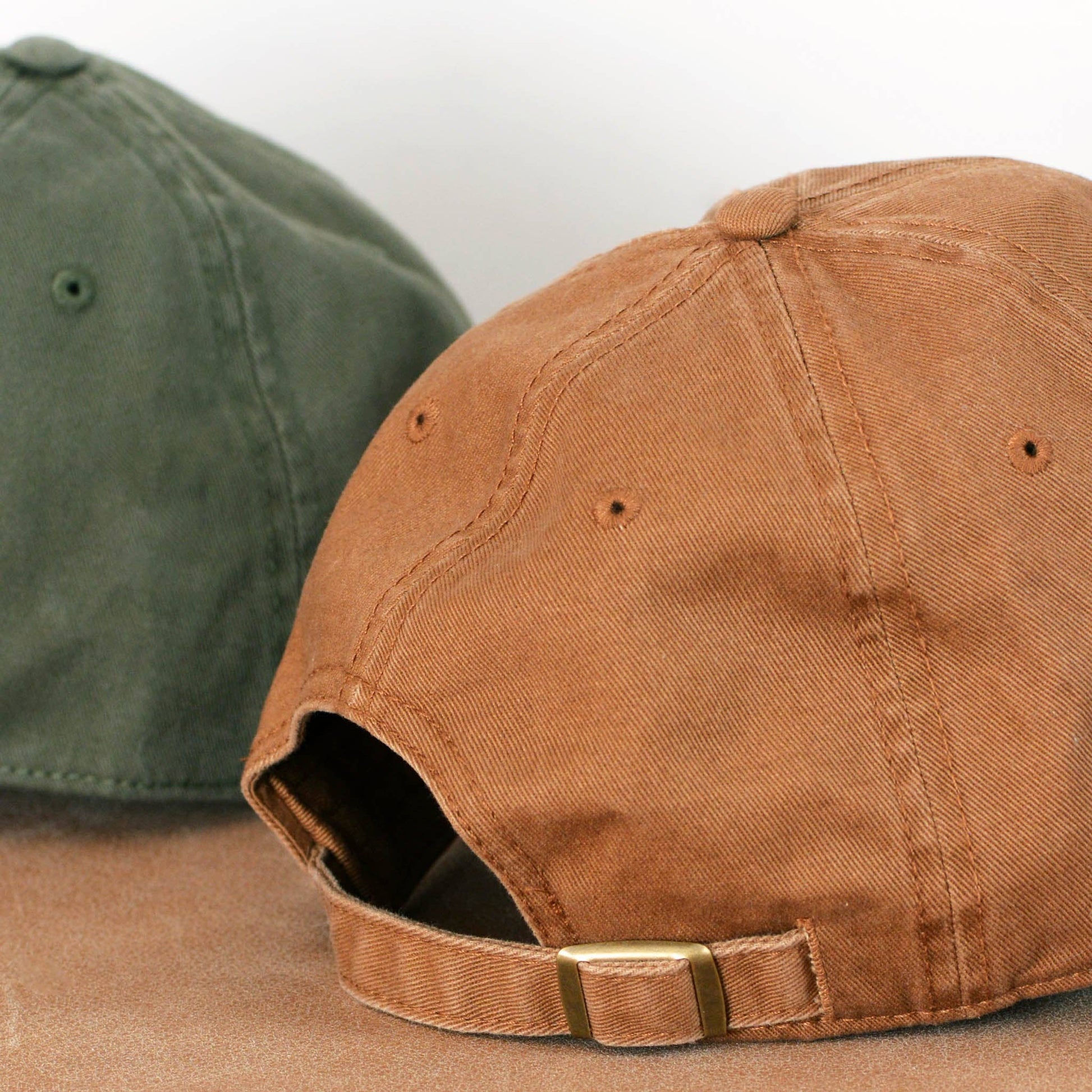 I Think I Need More Coffee embroidered cotton dad cap with adjustable fit.