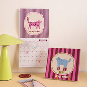 Good Tuesday 2027 Arty Dogs compact illustrated wall calendar.