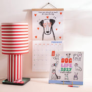 Good Tuesday 2027 Dog Life illustrated wall calendar for dog lovers.