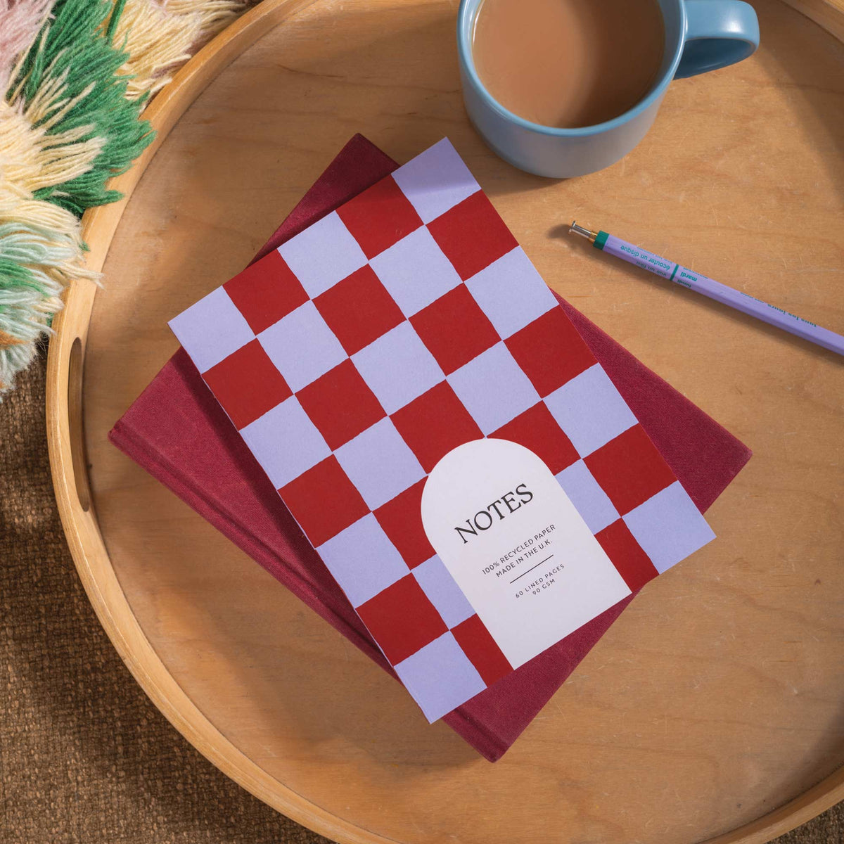 Good Tuesday Blue Berry Check A5 lined notebook in berry red and periwinkle.