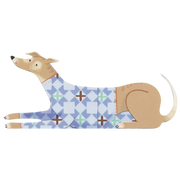 Dog wearing a blue patterned sweater on a white background