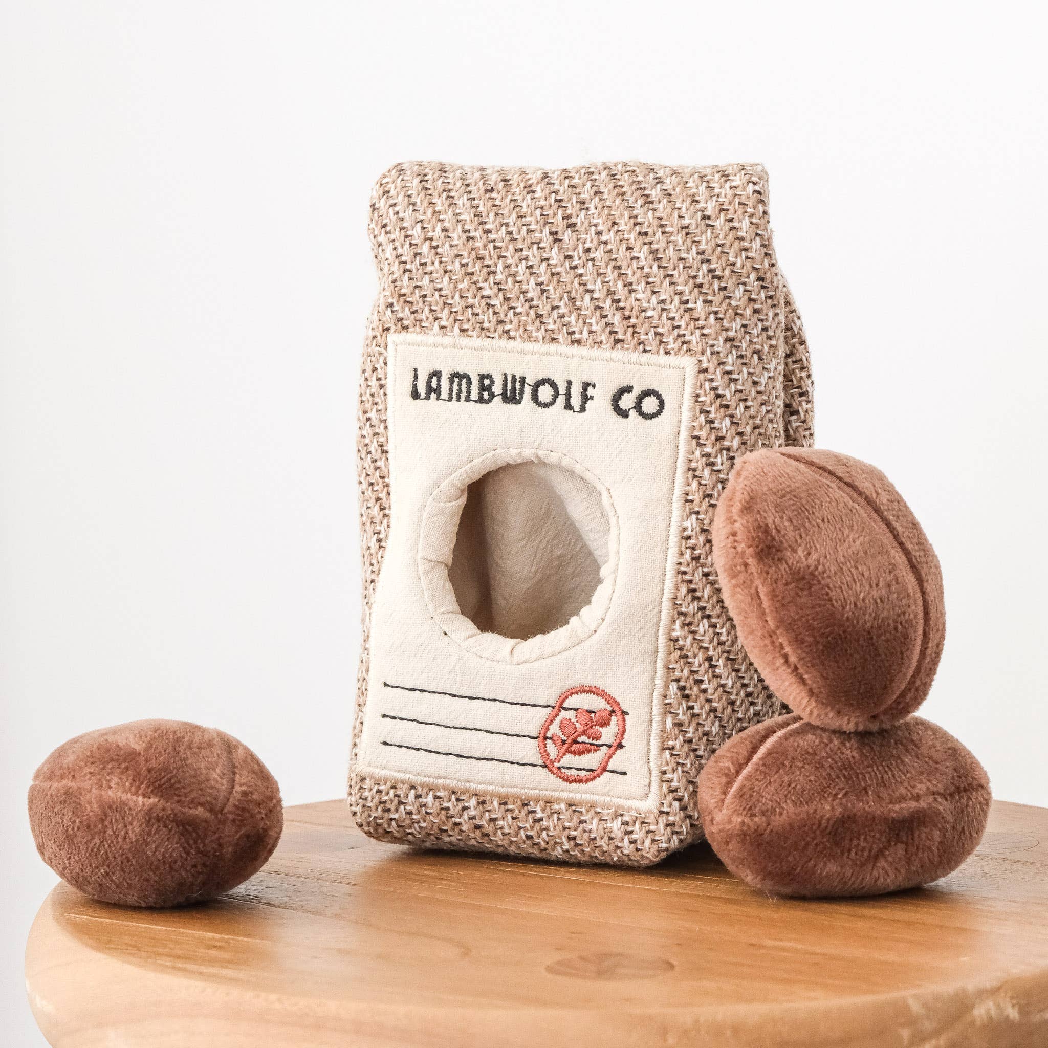 Coffee bean burrow dog toy with hidden squeaky plush coffee beans