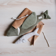 Flying fish dog toy with hidden treat pockets and enrichment features