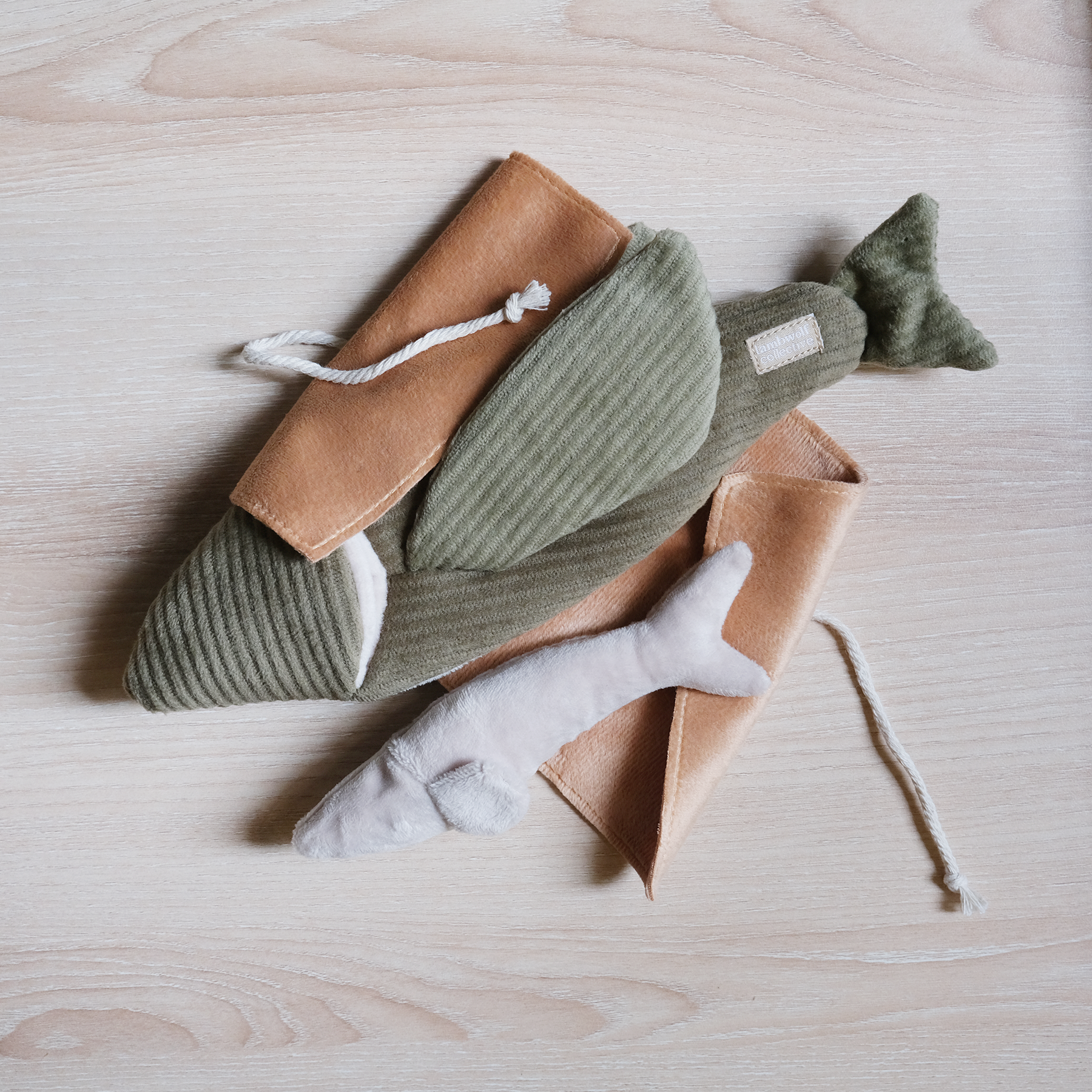 Flying fish dog toy with hidden treat pockets and enrichment features