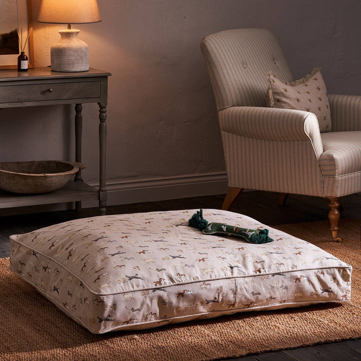 Deep-filled dog mattress with removable washable cover for modern homes.
