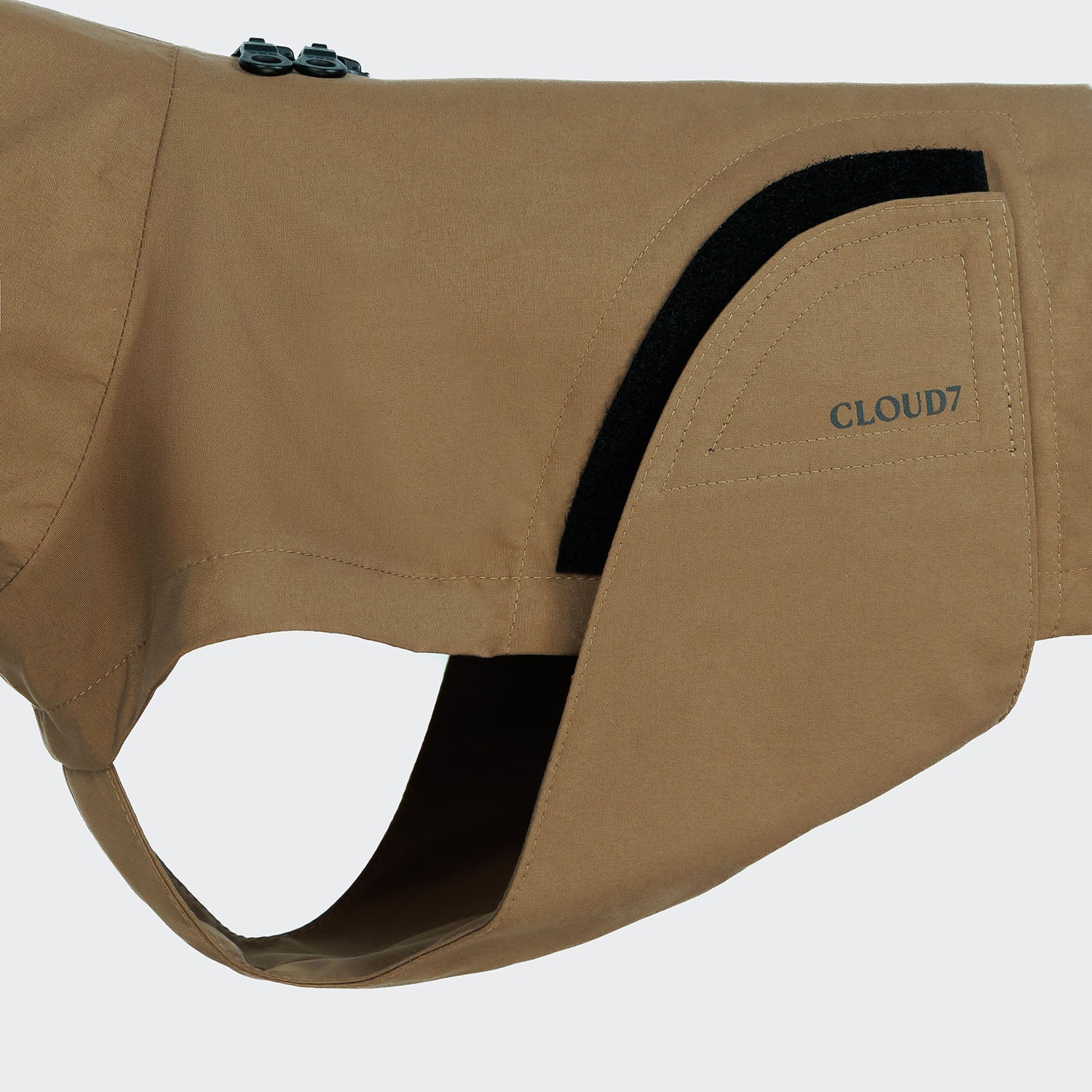 Brown dog coat with black trim and 'Cloud7' branding on a white background