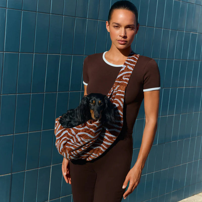 Premium woven dog sling carrier designed for small dogs up to 7kg.