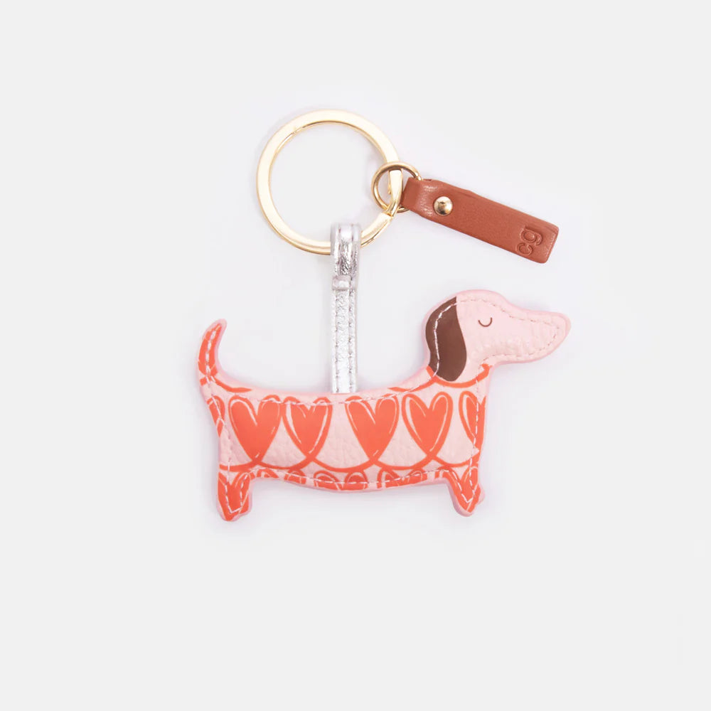 Orange looped hearts sausage dog keyring with gold-tone hardware and tan leather-look tab.