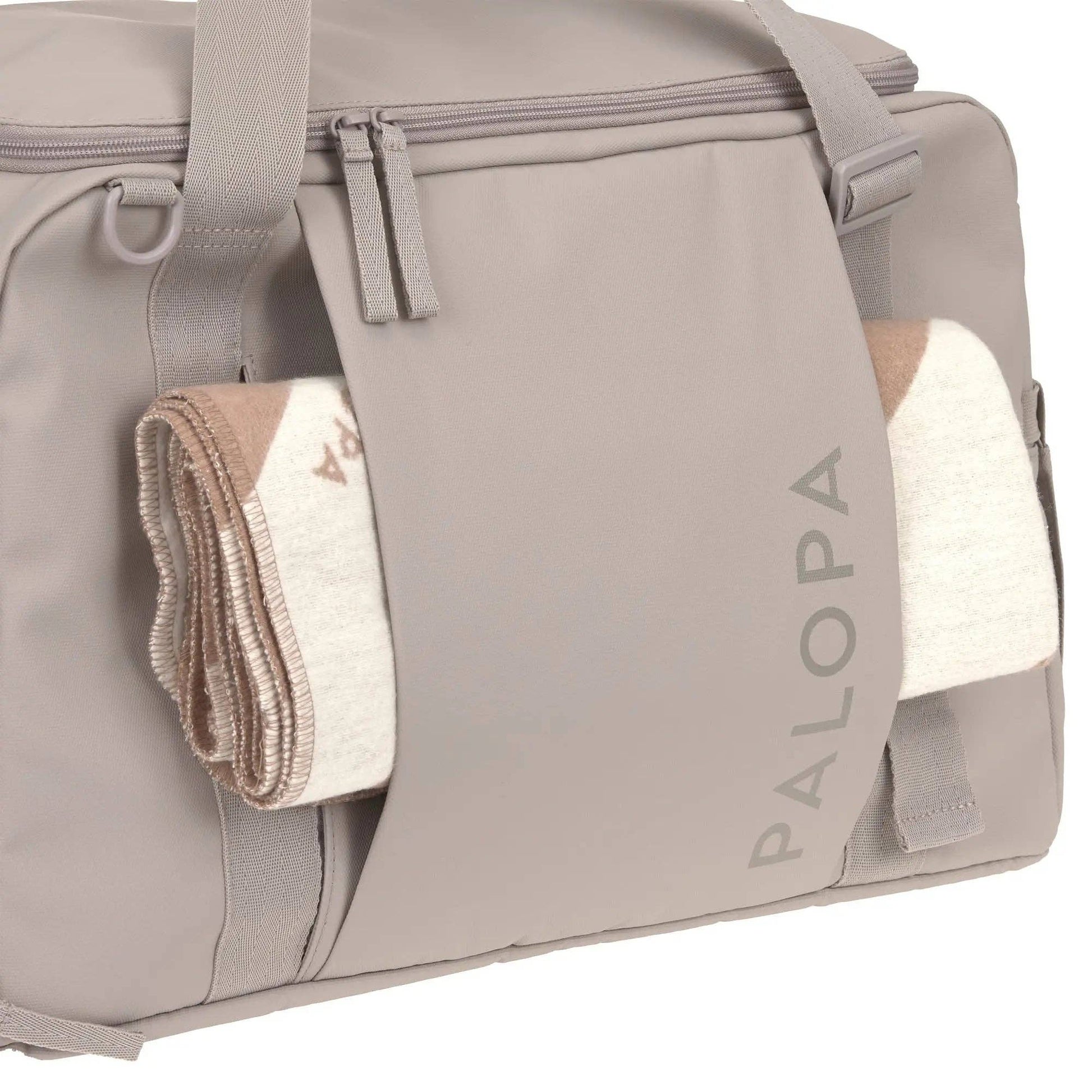 PALOPA Tokano taupe travel bag made from recycled water-resistant materials for adventures with dogs.