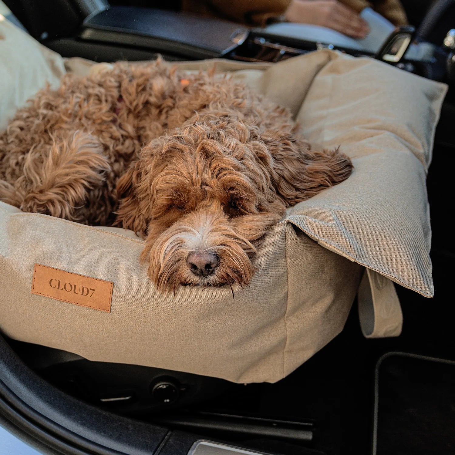 Cloud7 Getaway dog car seat in sand colour designed for safe and comfortable travel.
