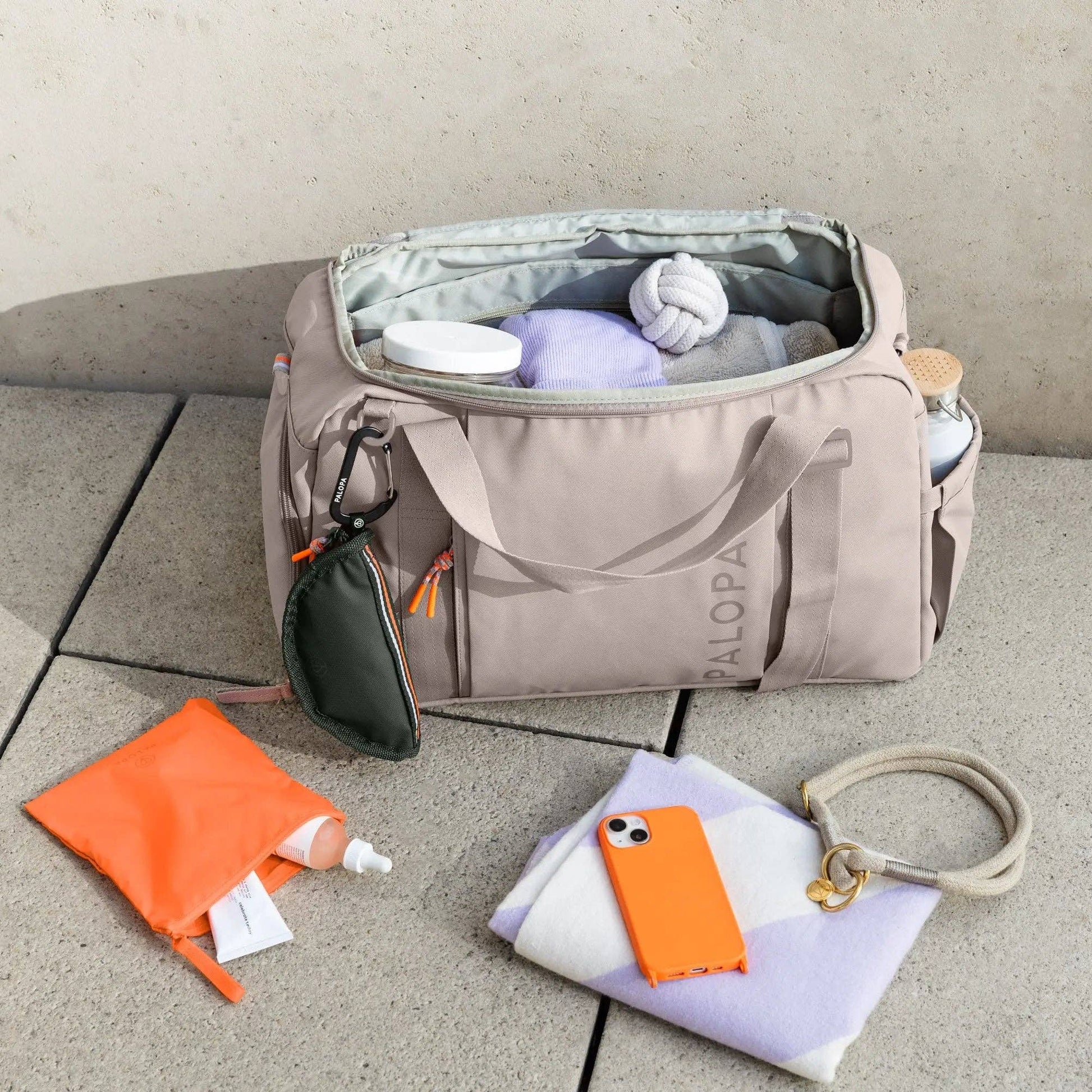 Premium weekender bag designed for dog owners travelling with pet accessories, clothing and essentials.