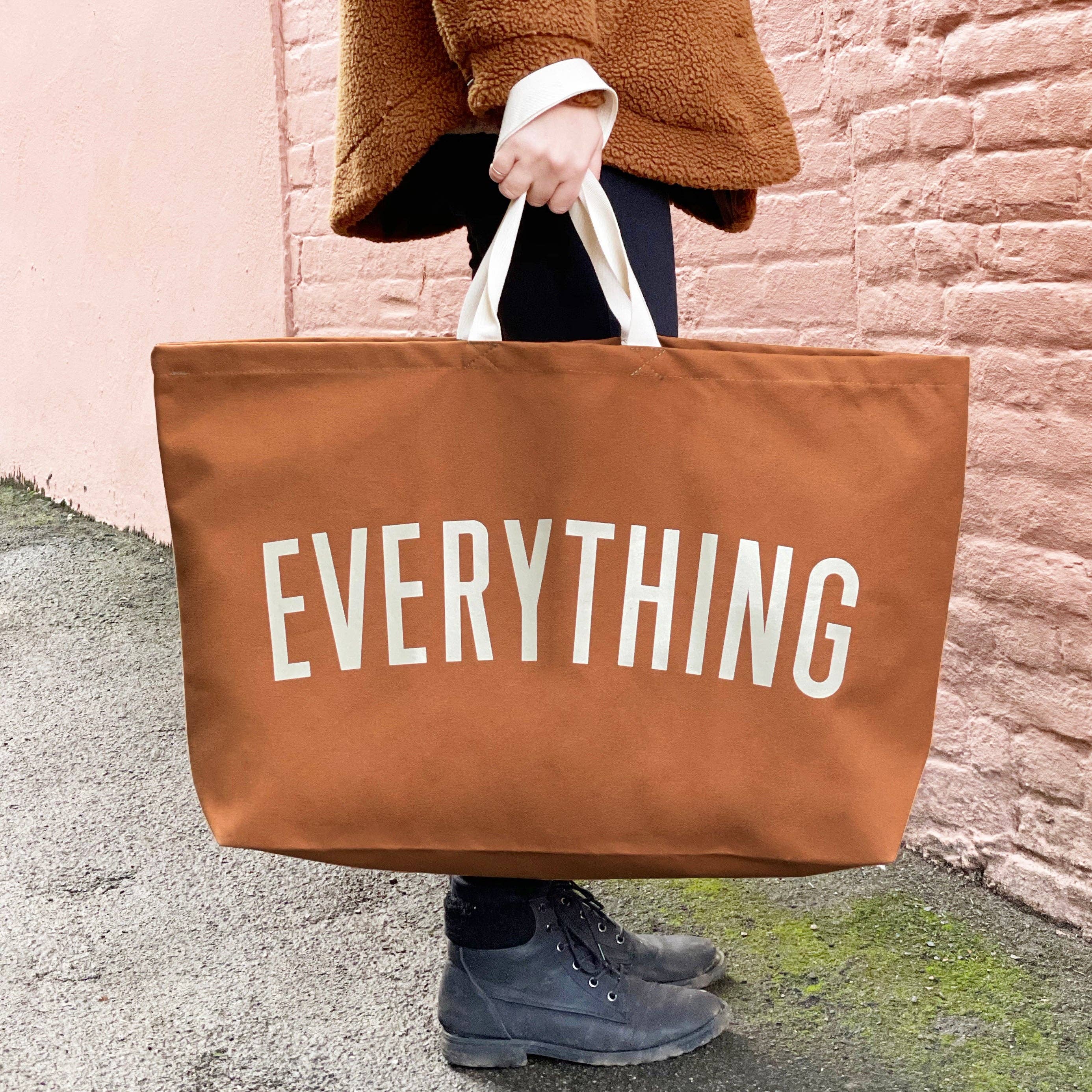 Stylish oversized tote bag for modern dog-loving lifestyles.
