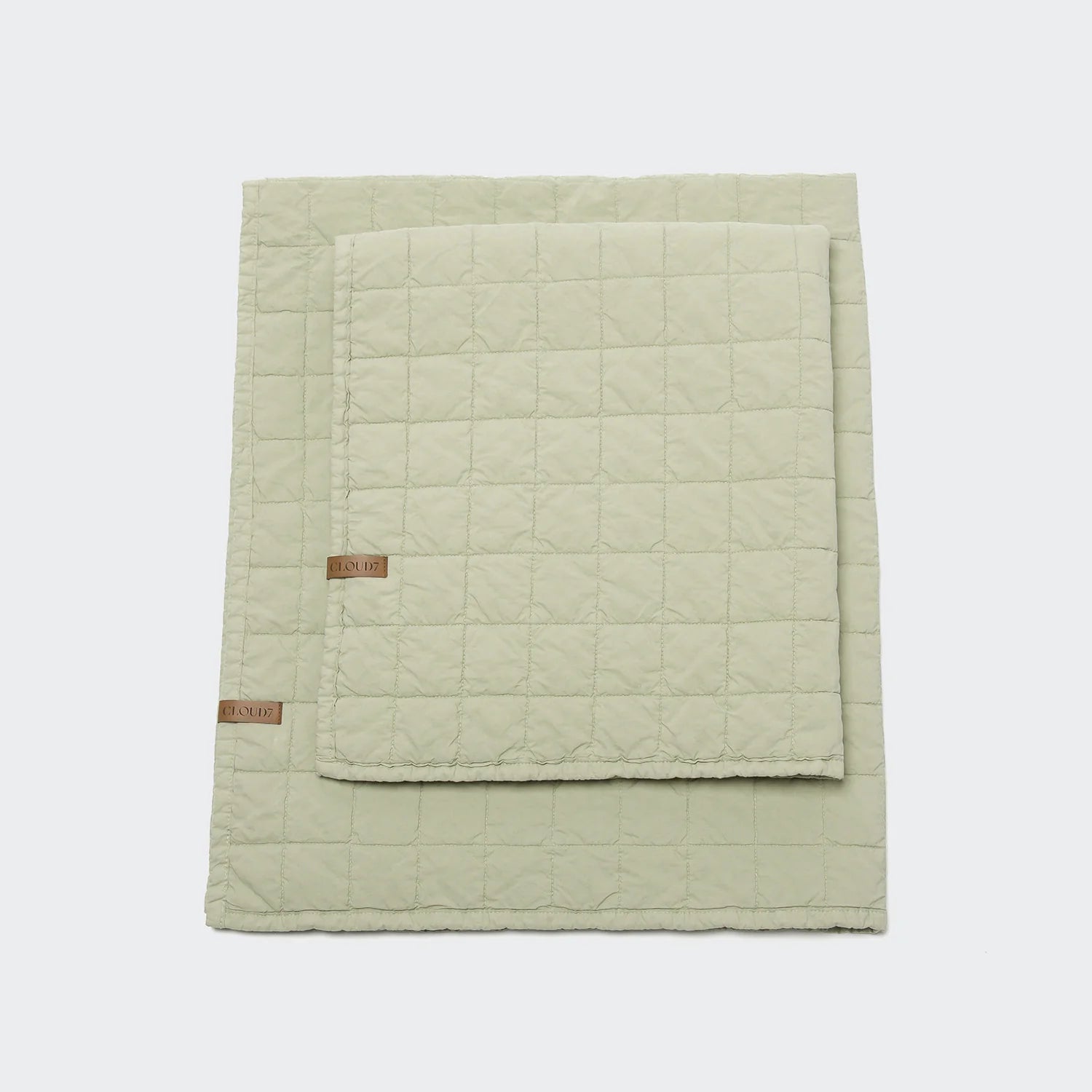Premium dog blanket featuring breathable cotton percale fabric in a faded moss green colour.